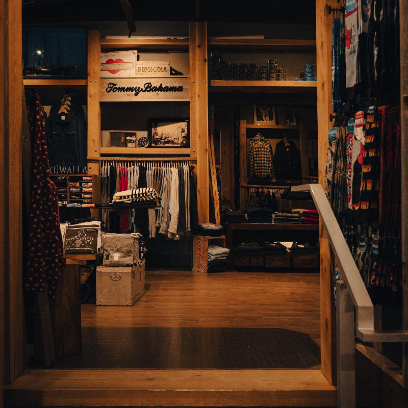 Inside of NYLA Fresh Thread's Nanaimo menswear store featuring hanging clothing from Tommy Bahama