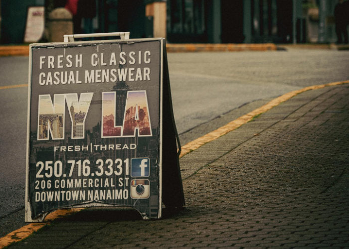 Classic and Casual Menswear store signage with NYLA Fresh Thread Logo